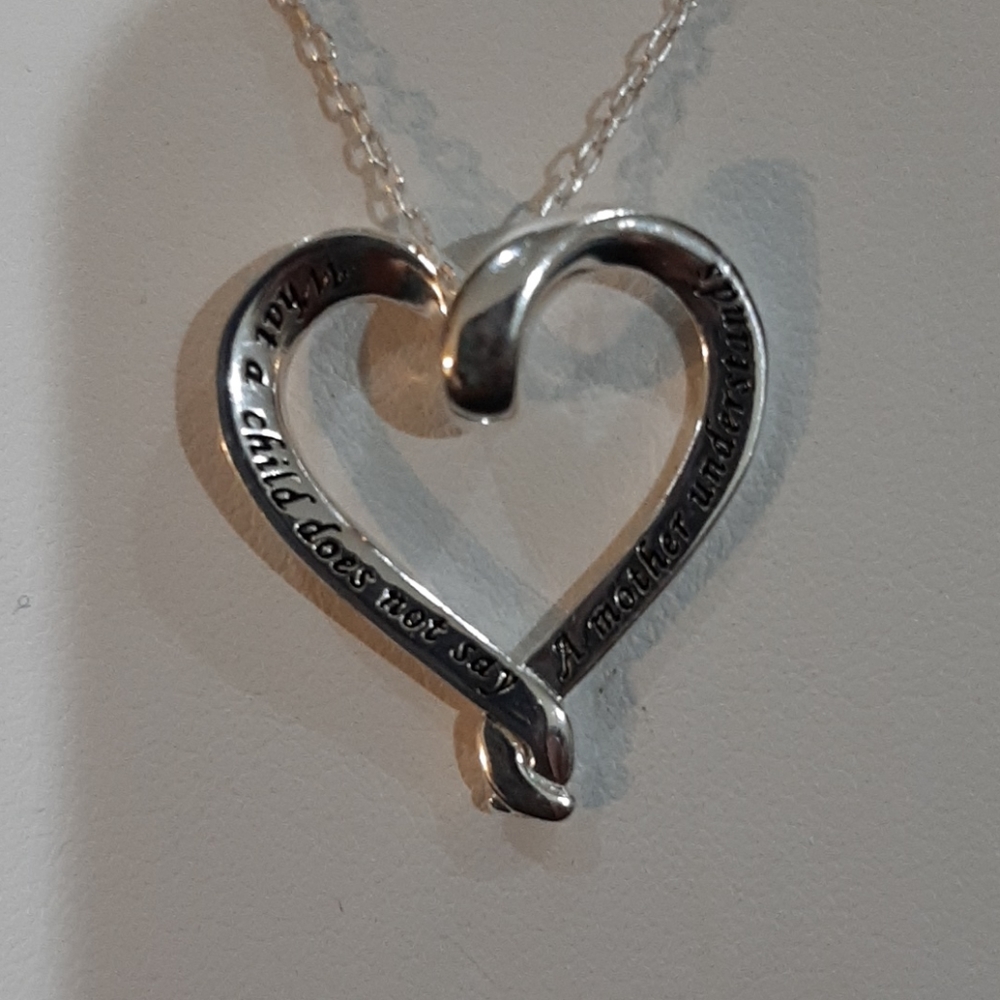 Sterling silver Child hart “What a child does not say A mother understands”